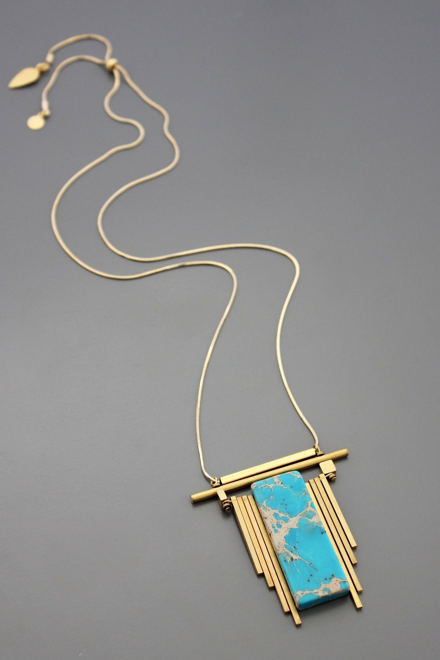 EMI730 Geometric turquoise and brass necklace