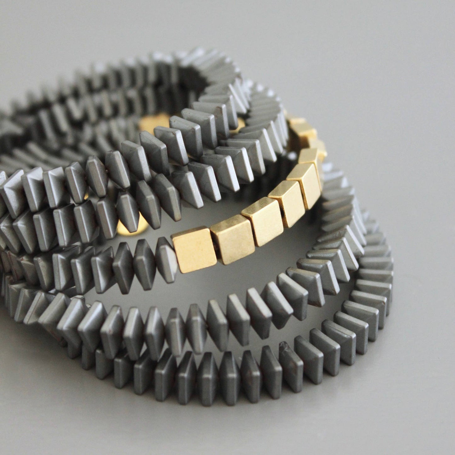 CHRB06 Hematite and brass wrap bracelet